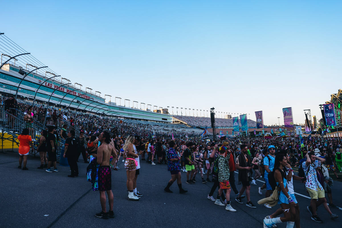 Festival attendees take in day one of Electric Daisy Carnival at the Las Vegas Motor Speedway o ...