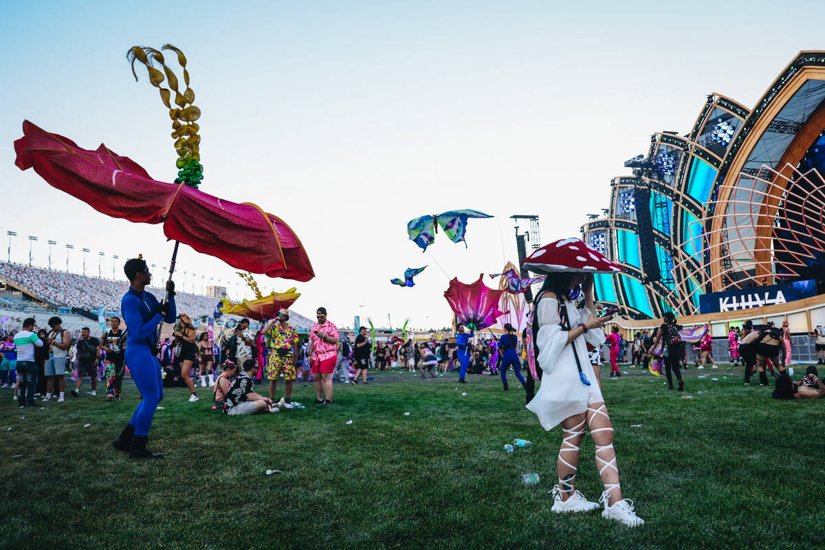 Festival attendees take in day one of Electric Daisy Carnival at the Las Vegas Motor Speedway o ...