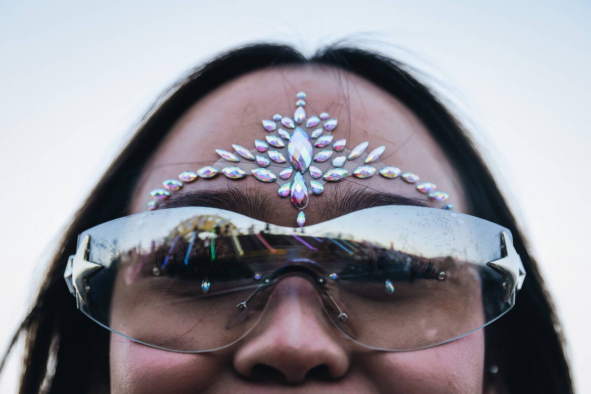 A festival attendee shows off their rhinestones during day one of Electric Daisy Carnival at th ...