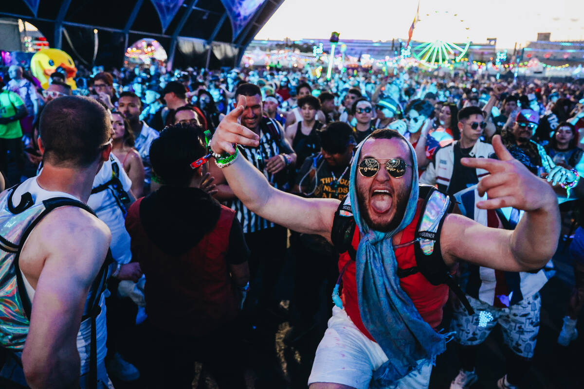 EDC attendees dance to a DJ set during day one of Electric Daisy Carnival at the Las Vegas Moto ...