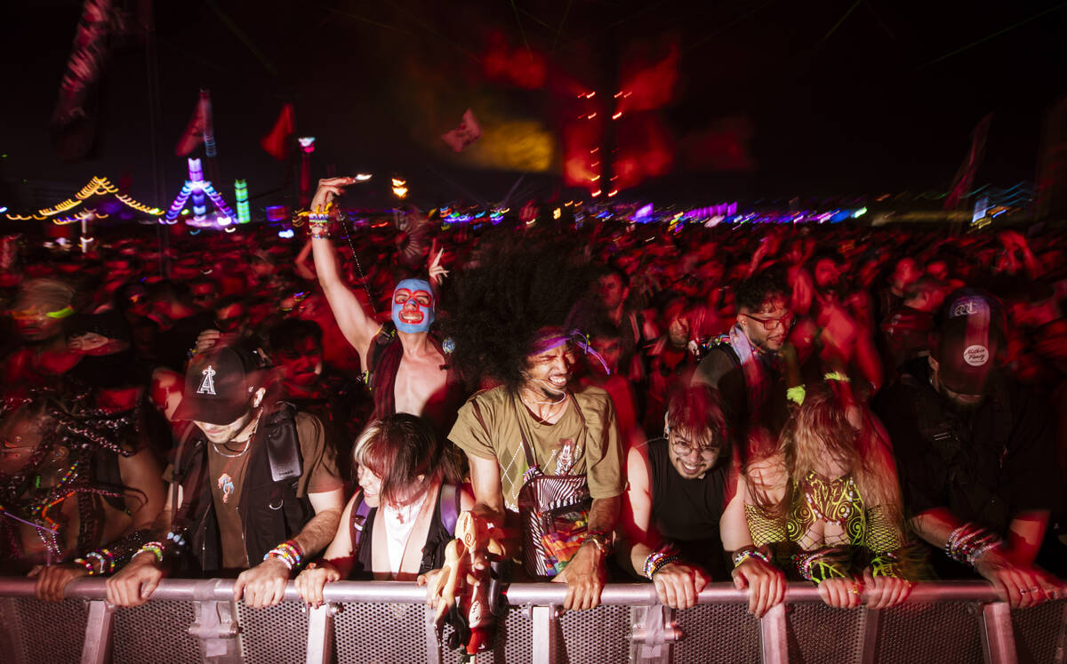 Attendees dance as Marauda performs at the Basspod stage during the first night of the Electric ...