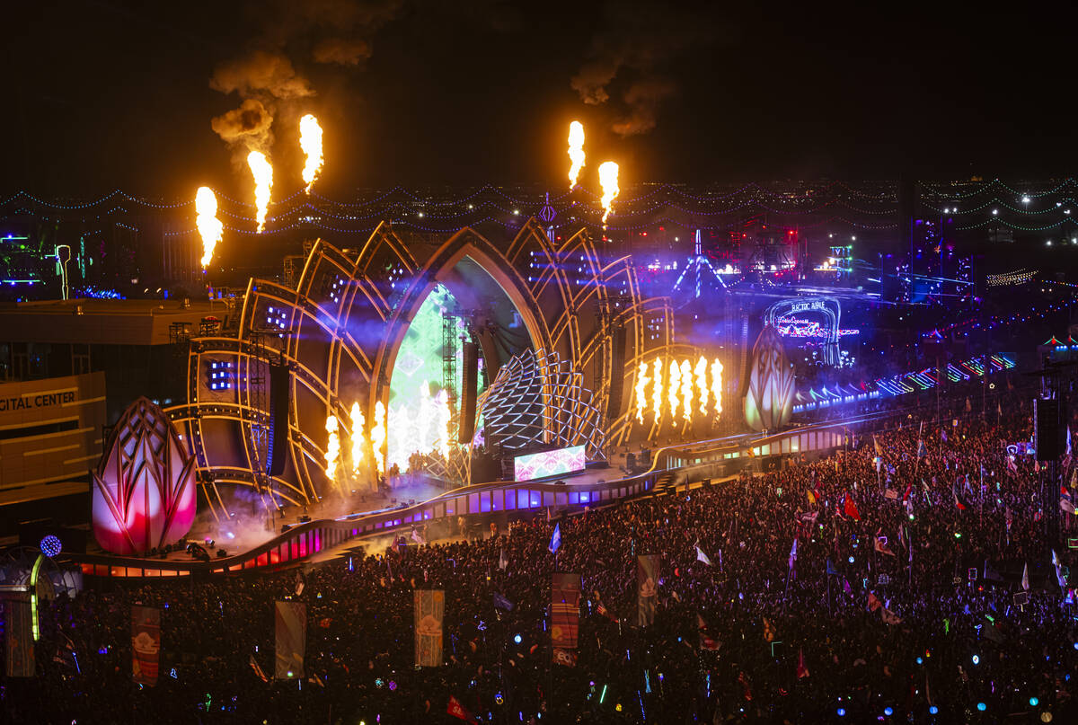 Pyrotechnics go off as Slander performs at the Cosmic Meadow stage during the first night of th ...