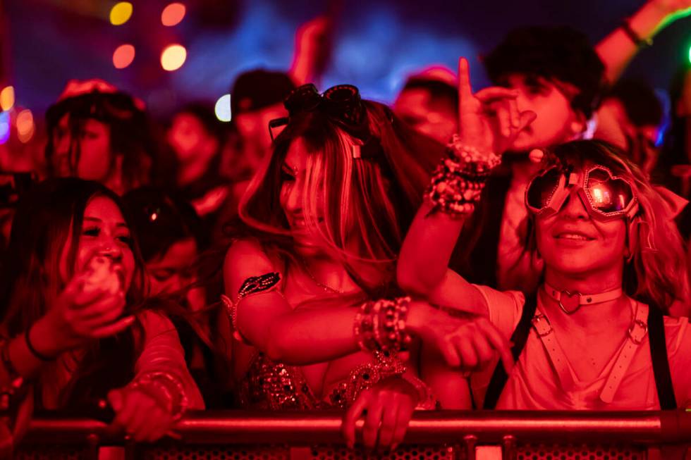 Attendees dance as Marauda performs at the Basspod stage during the first night of the Electric ...