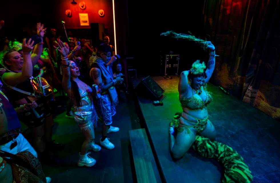 Burlesque performer Elyse Elaine entertains the crowd during the first night of the Electric Da ...