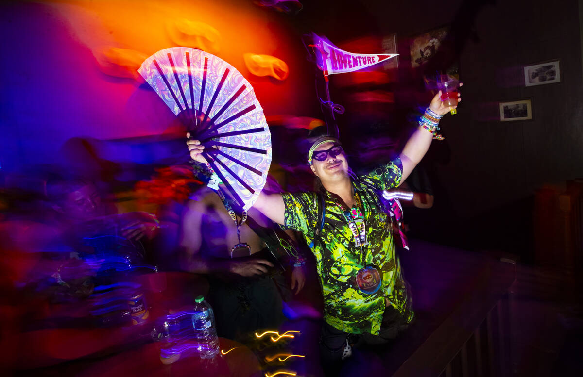 An attendee dances during the first night of the Electric Daisy Carnival at the Las Vegas Motor ...