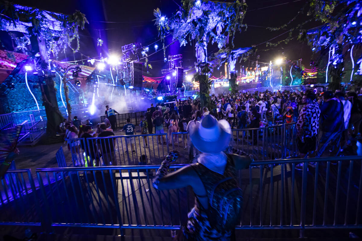 Attendees dance at the Bionic Jungle stage during the second night of the Electric Daisy Carniv ...