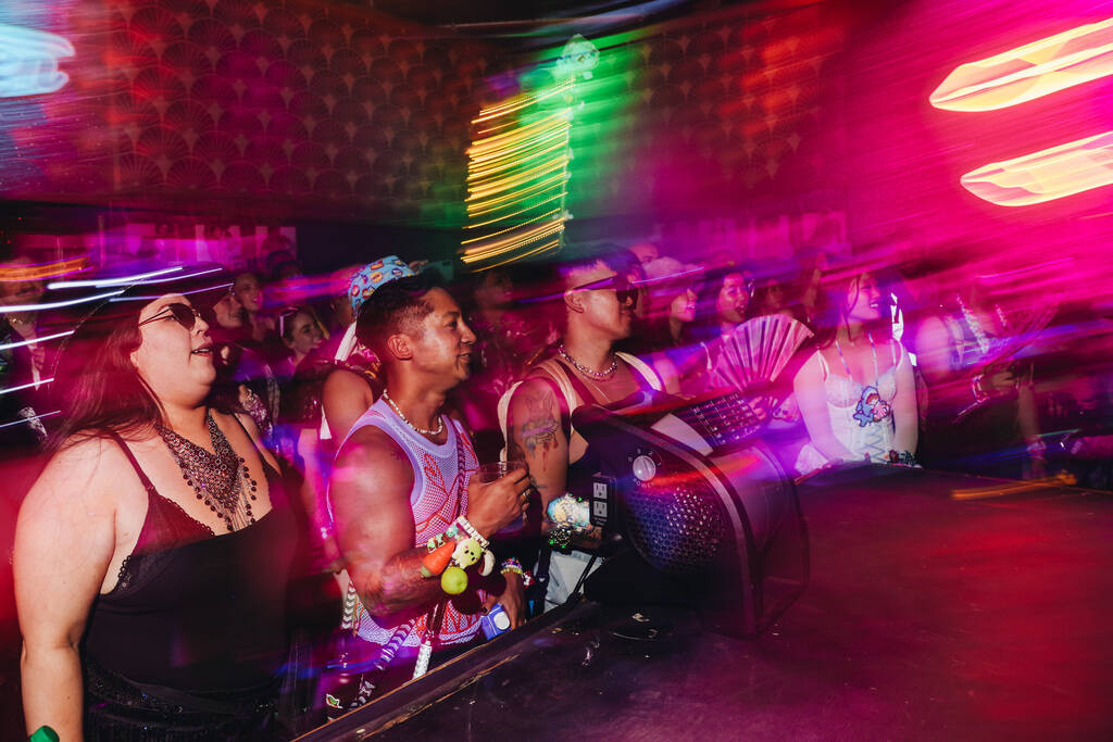 A crowd watches performances inside of The Queen during the second day of the Electric Daisy Ca ...