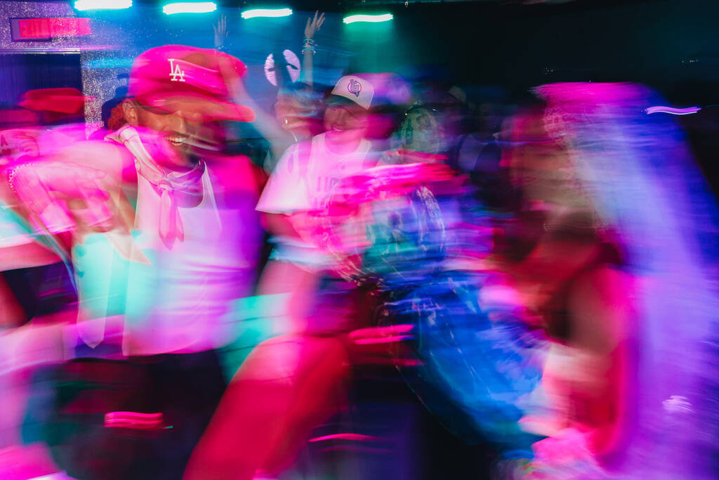 Ravers dance during the second day of the Electric Daisy Carnival at the Las Vegas Motor Speedw ...