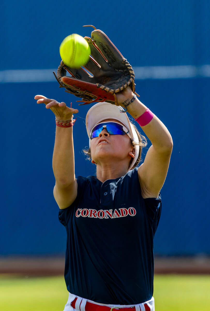 Coronado outfielder Caleigh Burns (4) looks in a pop fly against a Douglas batter during secon ...