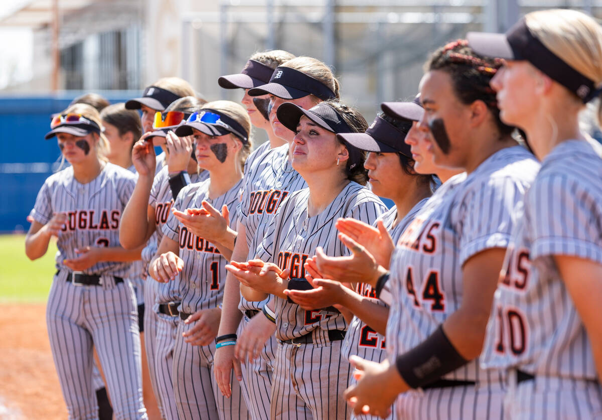 Douglas players are a bit disappointed after losing 4-2 to Coronado during their 5A softball st ...