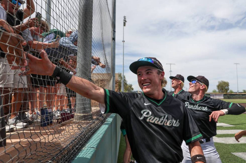 Palo Verde outfielder Jace Jefferies (4) reaches for fans after his team won a Class 5A basebal ...