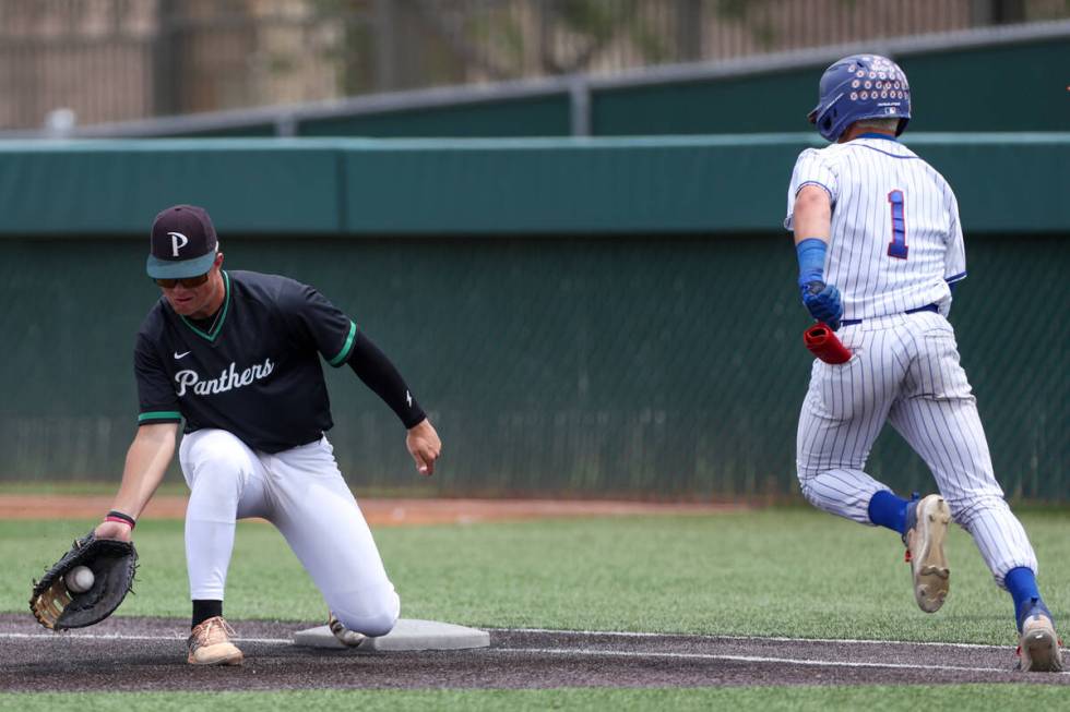 Palo Verde first baseman Tanner Johns (21) catches for an out on Reno’s Jackson Sellers ...