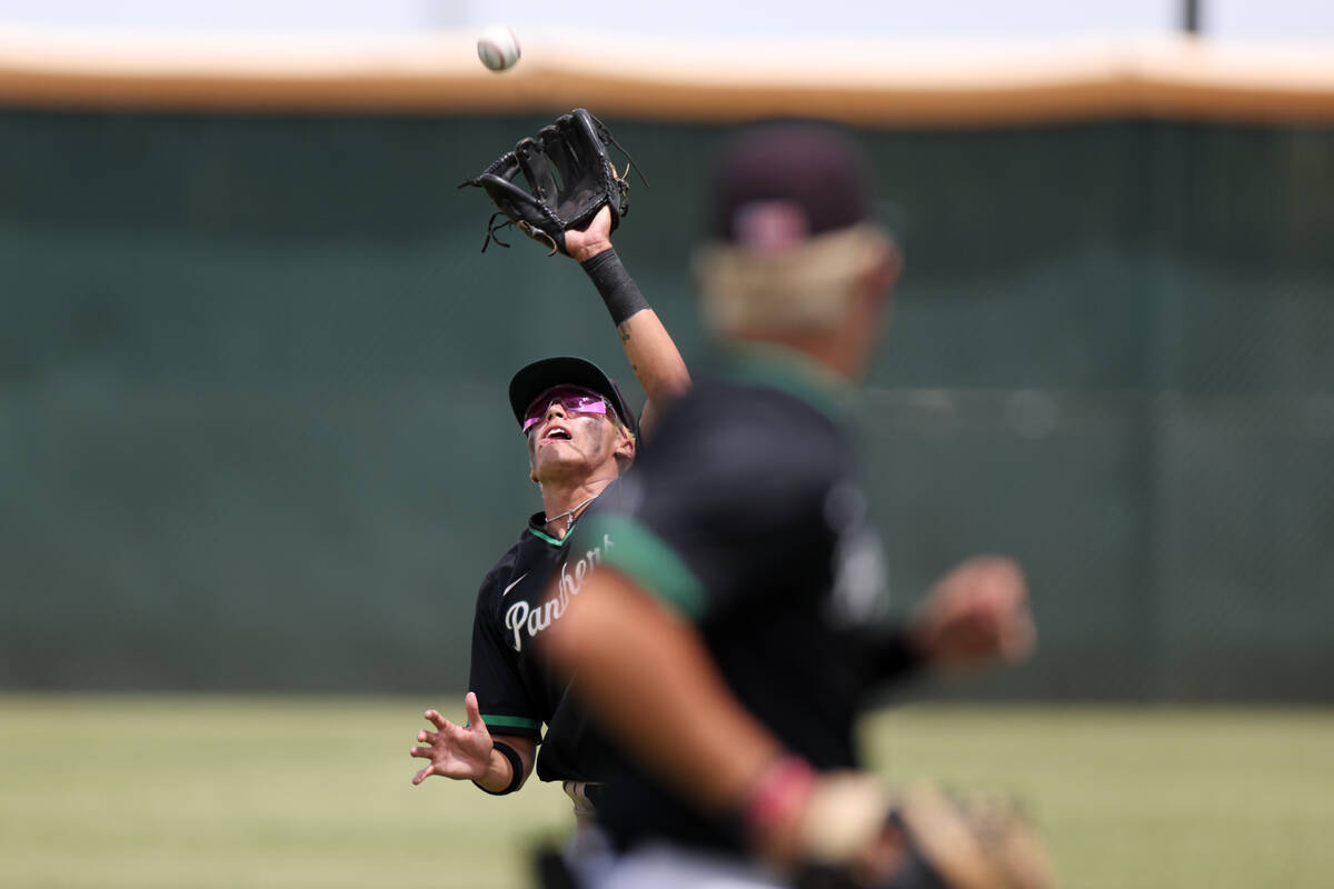 Palo Verde infielder Luke Herrera (2) prepares to catch for an out on Reno during a Class 5A ba ...