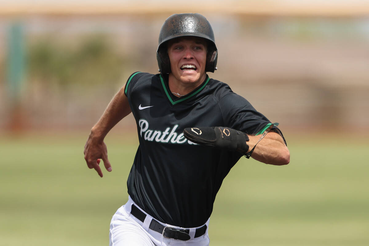 Palo Verde infielder Andrew Kaplan (15) sprints around the bases before scoring during a Class ...