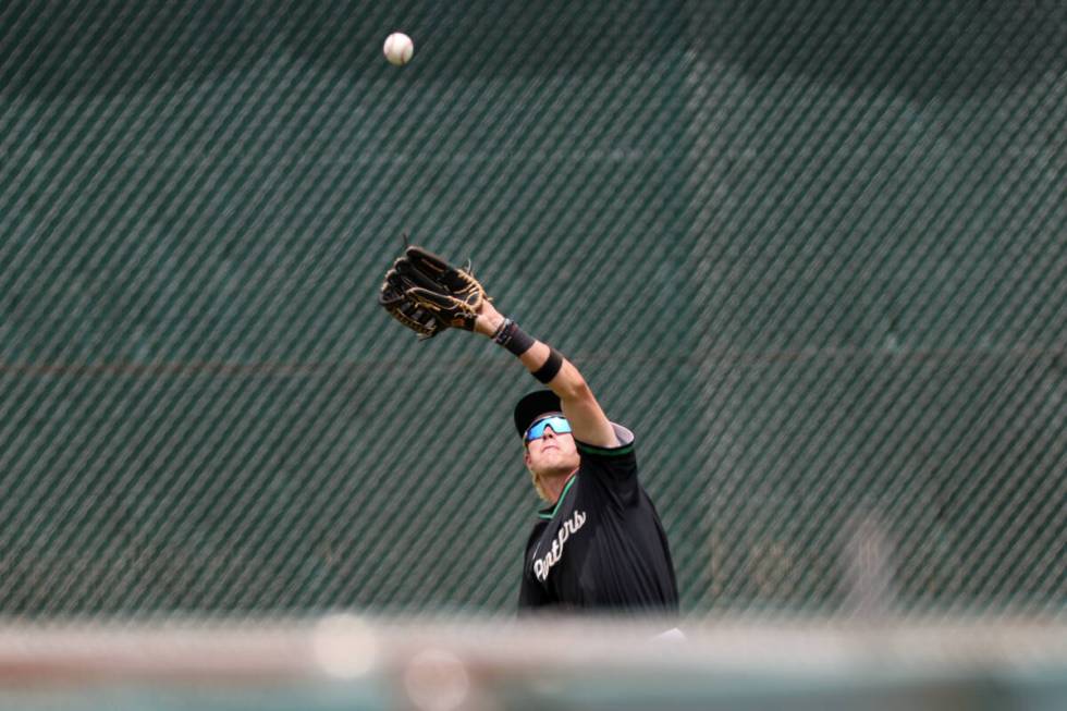 Palo Verde outfielder Jace Jefferies (4) prepares to catch a foul ball for an out on Reno durin ...