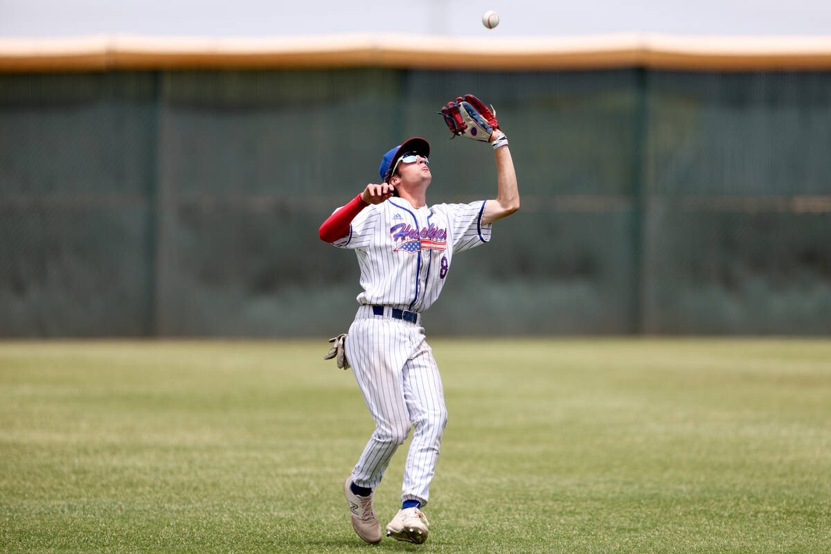 Reno’s Harvey Smerdon prepares to catch for an out on Palo Verde during a Class 5A baseb ...