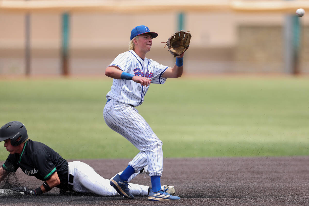 Palo Verde outfielder Jace Jefferies (4) slides safely into second base while Reno’s Log ...
