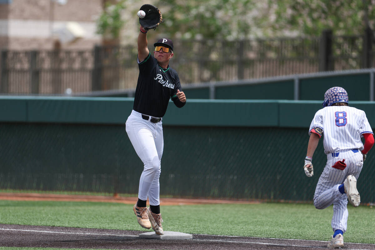 Palo Verde infielder Tanner Johns (21) catches to out Reno’s Harvey Smerdon (8) during a ...