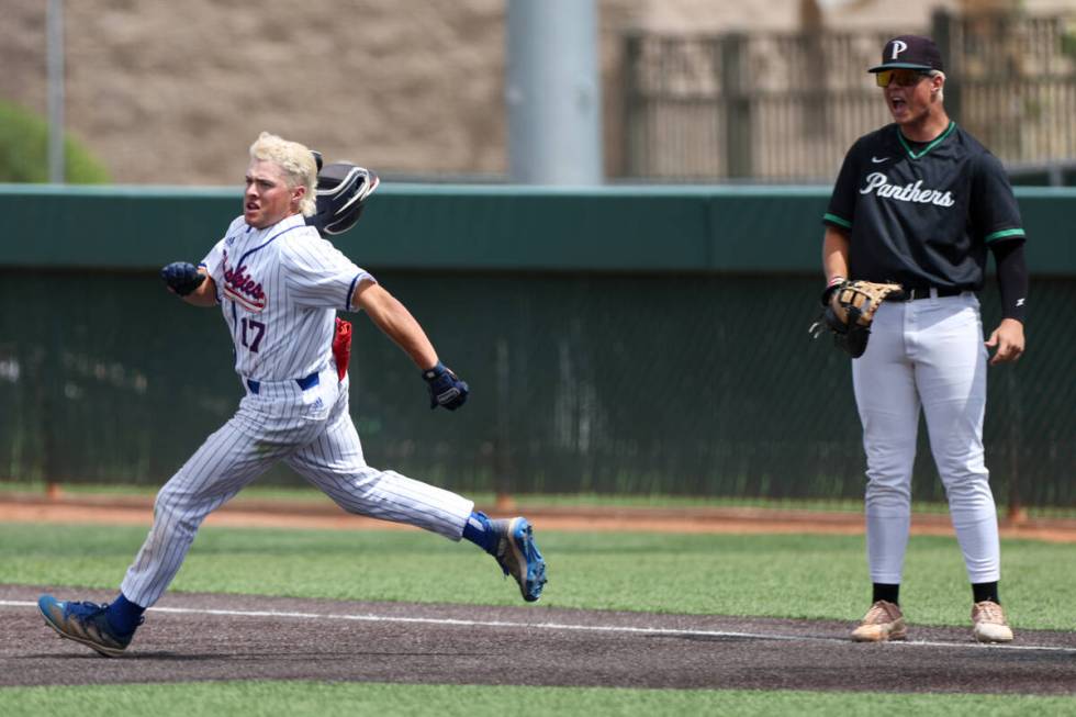 Reno’s Jaydon Loose (17) rounds first base while Palo Verde infielder Tanner Johns (21) ...