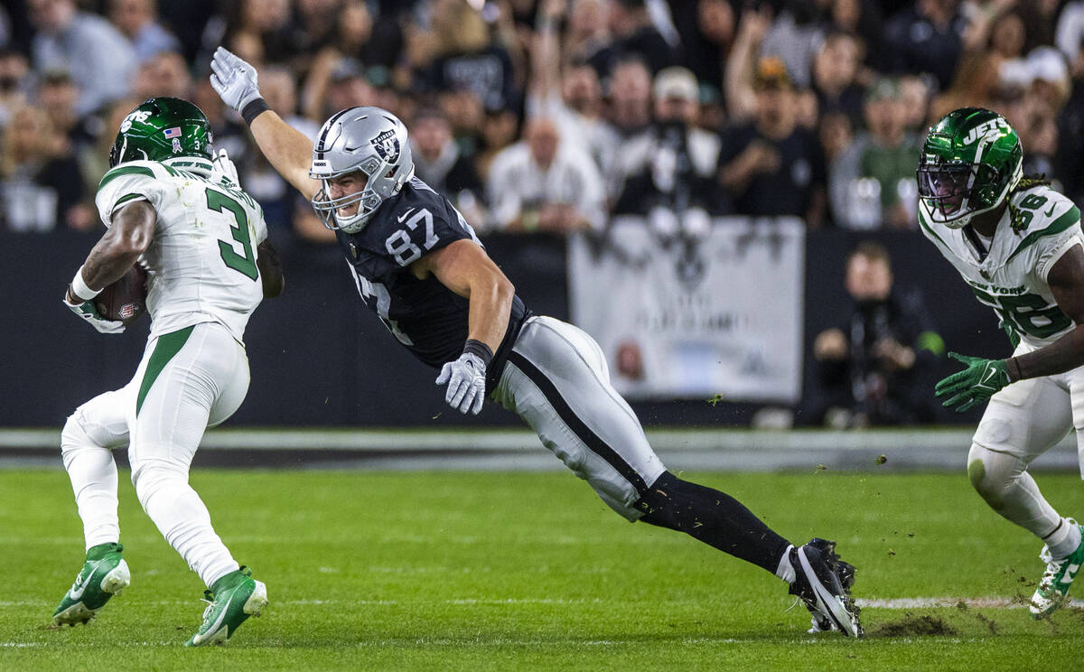 Raiders tight end Michael Mayer (87) dives to tackle New York Jets safety Jordan Whitehead (3) ...