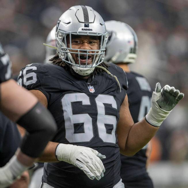 Raiders guard Dylan Parham (66) smiles during warm-ups before of an NFL game against the Denver ...