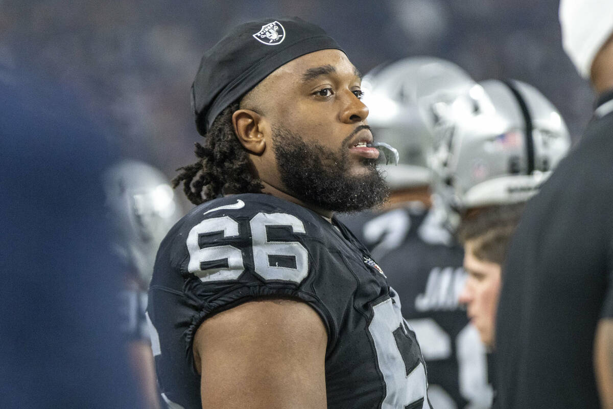 Raiders guard Dylan Parham (66) looks on from the sideline during the second half an NFL game a ...