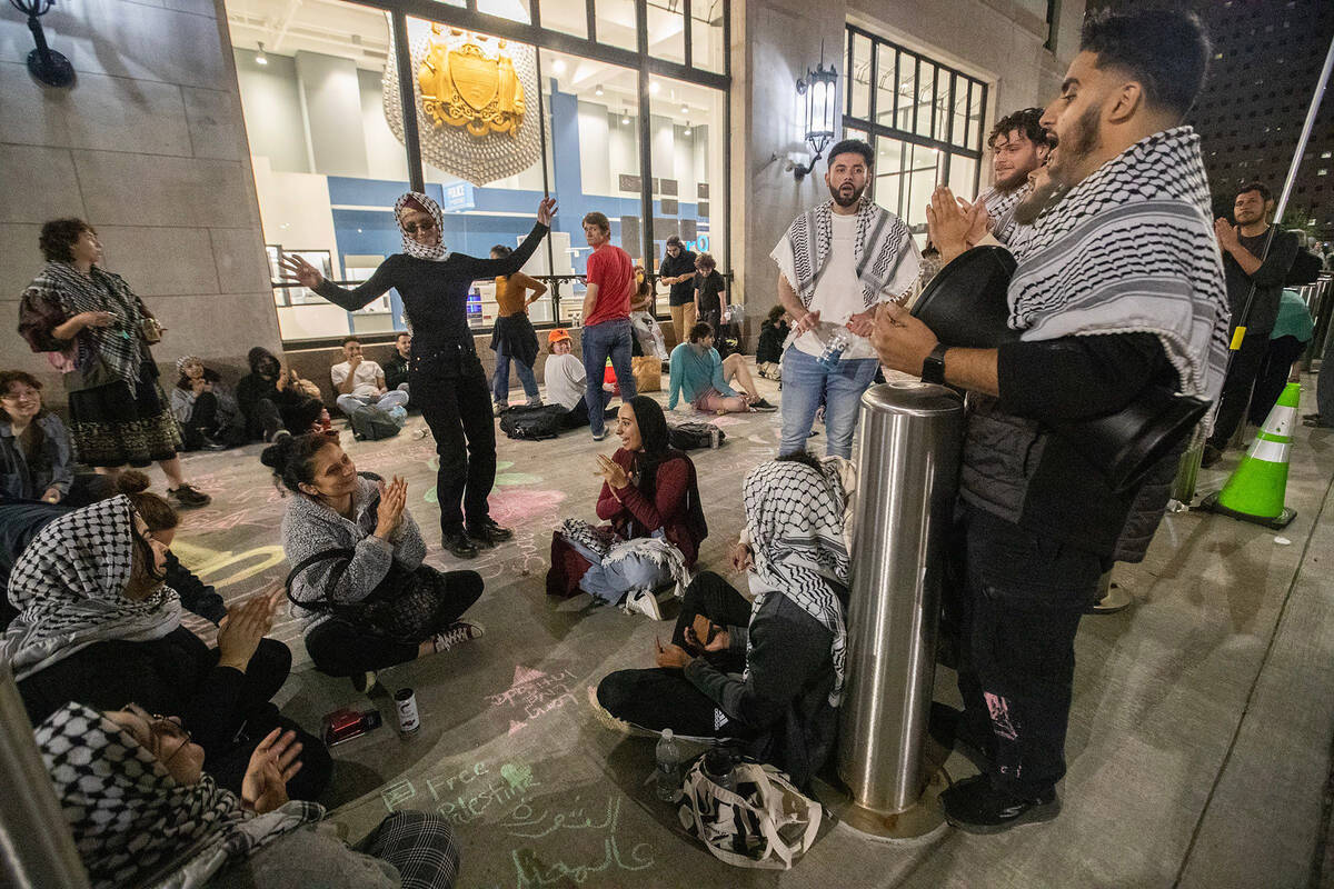 Pro-Palestinian protesters gather outside Philadelphia Police Headquarters on Broad Street on M ...