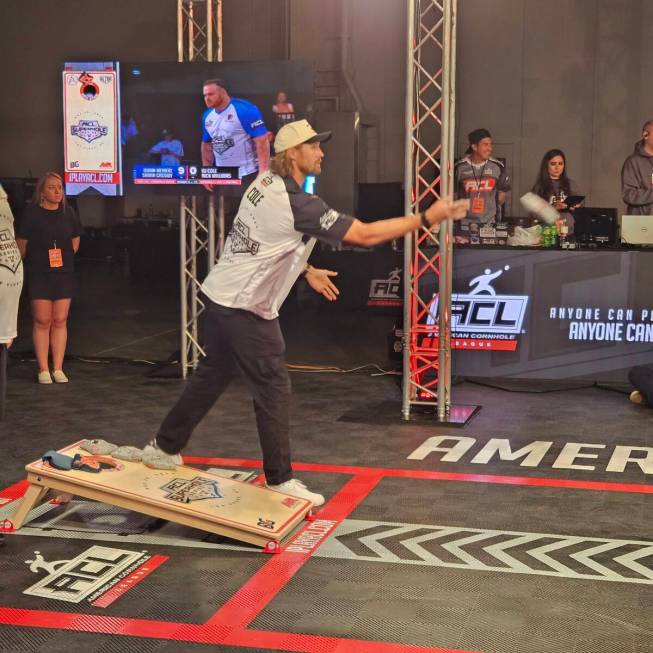 Raiders punter AJ Cole competes in the American Cornhole League's Superhole event Saturday, May ...