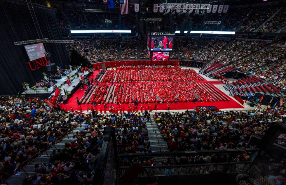 Graduate names are announced during UNLV spring graduation commencement exercises at the Thomas ...