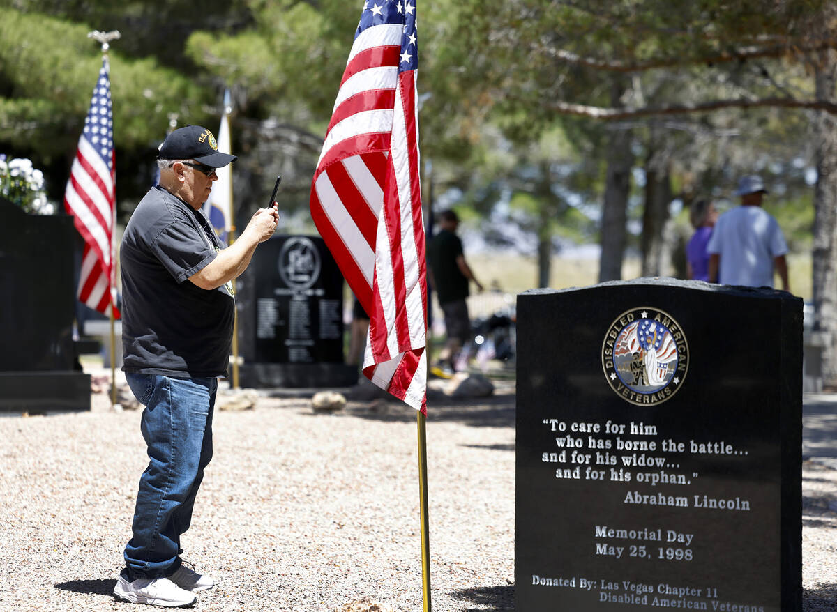 Retired U.S. Army veteran Larry King visits the Southern Nevada Veterans Memorial Cemetery on M ...