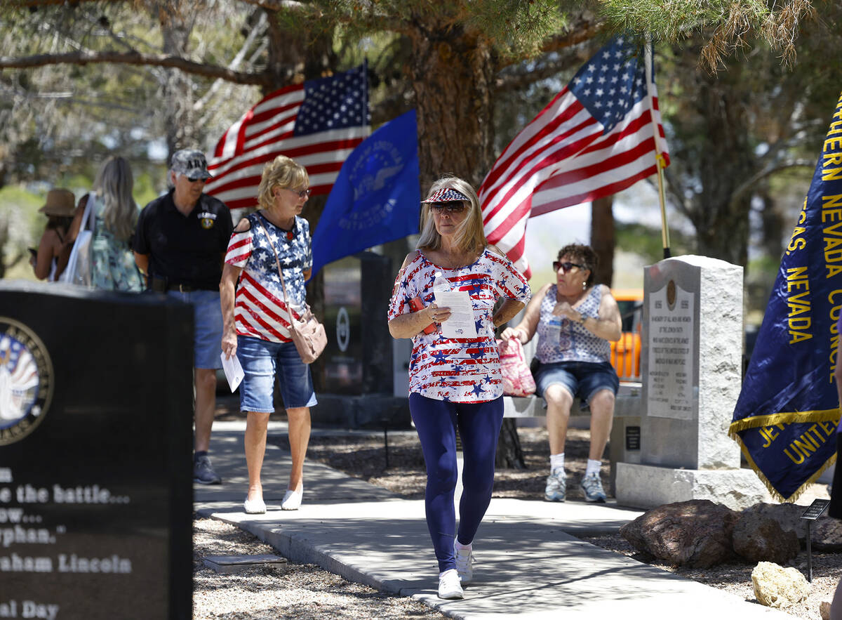 People visit the Southern Nevada Veterans Memorial Cemetery on Memorial Day Monday, May 27, 202 ...