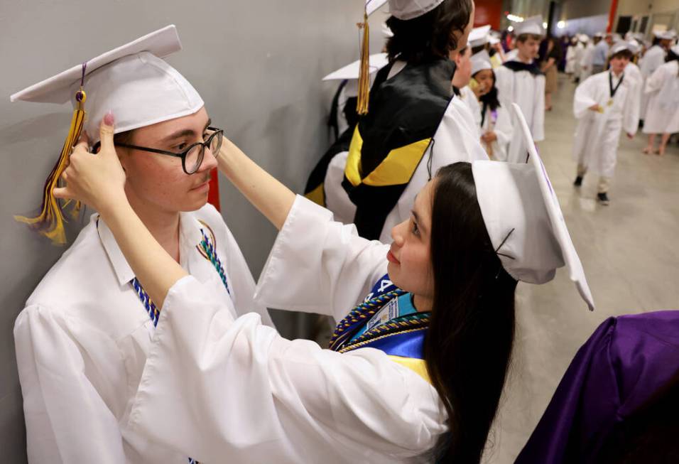 Durango High School students Rajko Varagic, left, and Nghi Le prepare for their graduation cere ...