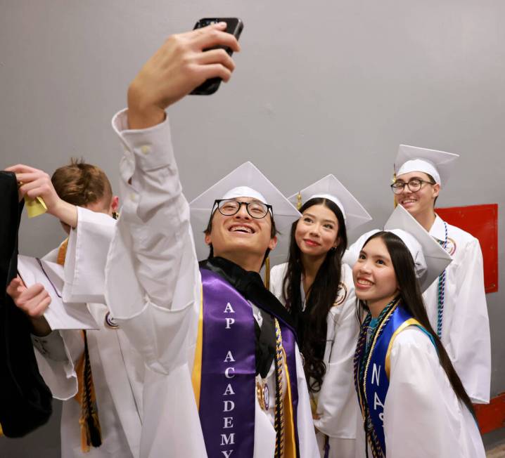 Durango High School students, from left, Xander Luber-Decena, Leslie De Jesus Bueno, Nghi Le an ...