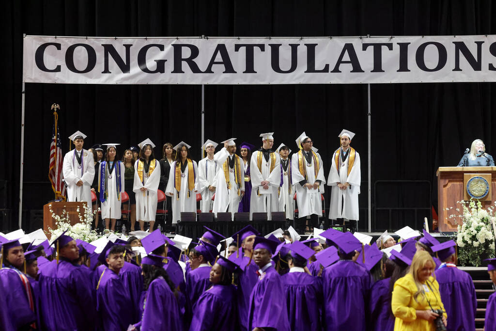 Durango High School students look for their families after the procession during graduation at ...