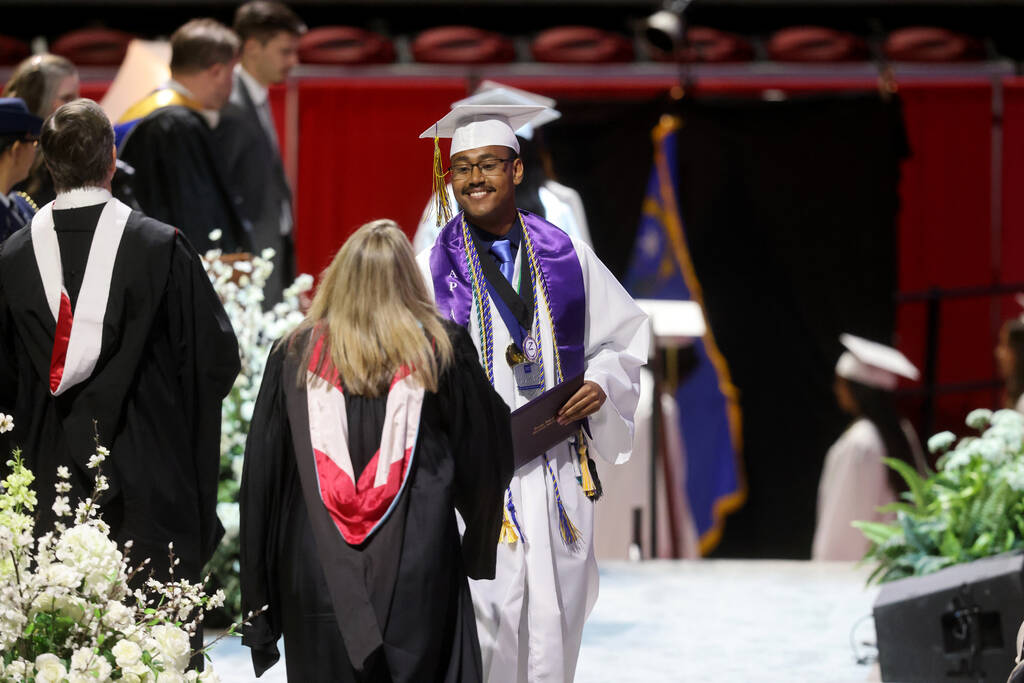 Durango High School students receive their diplomas during graduation at Thomas & Mack Cent ...