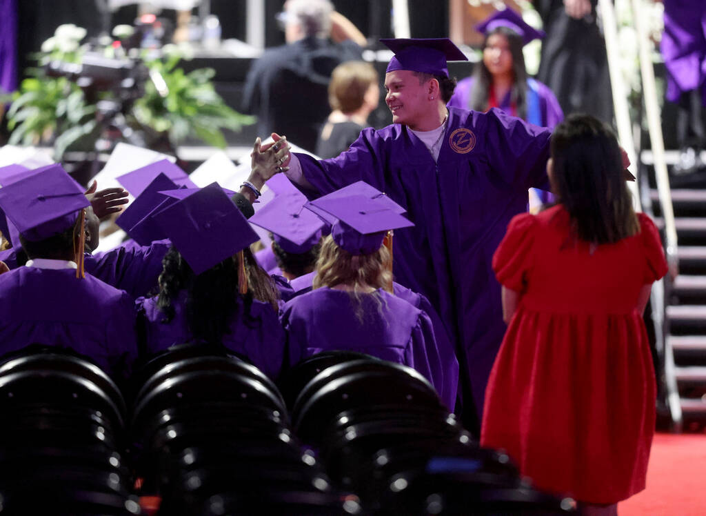 Durango High School students receive their diplomas during graduation at Thomas & Mack Cent ...