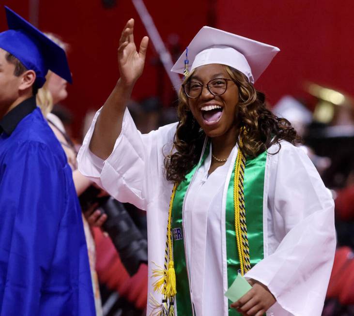 Green Valley High School students look for their families during the procession during graduati ...