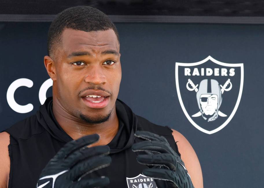 Raiders defensive end Tyree Wilson addresses the media after participating in organized team ac ...