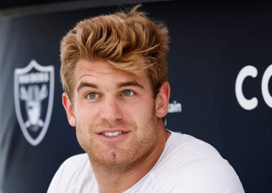 Raiders tight end Michael Mayer listens to reporters questions as he addresses the media after ...