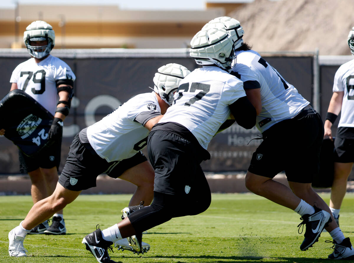 Raiders offensive tackle Thayer Munford Jr. (77) runs a blocking drill during organized team ac ...