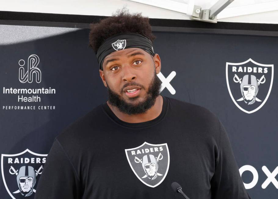 Raiders offensive tackle Thayer Munford Jr. addresses the media after participating in organize ...