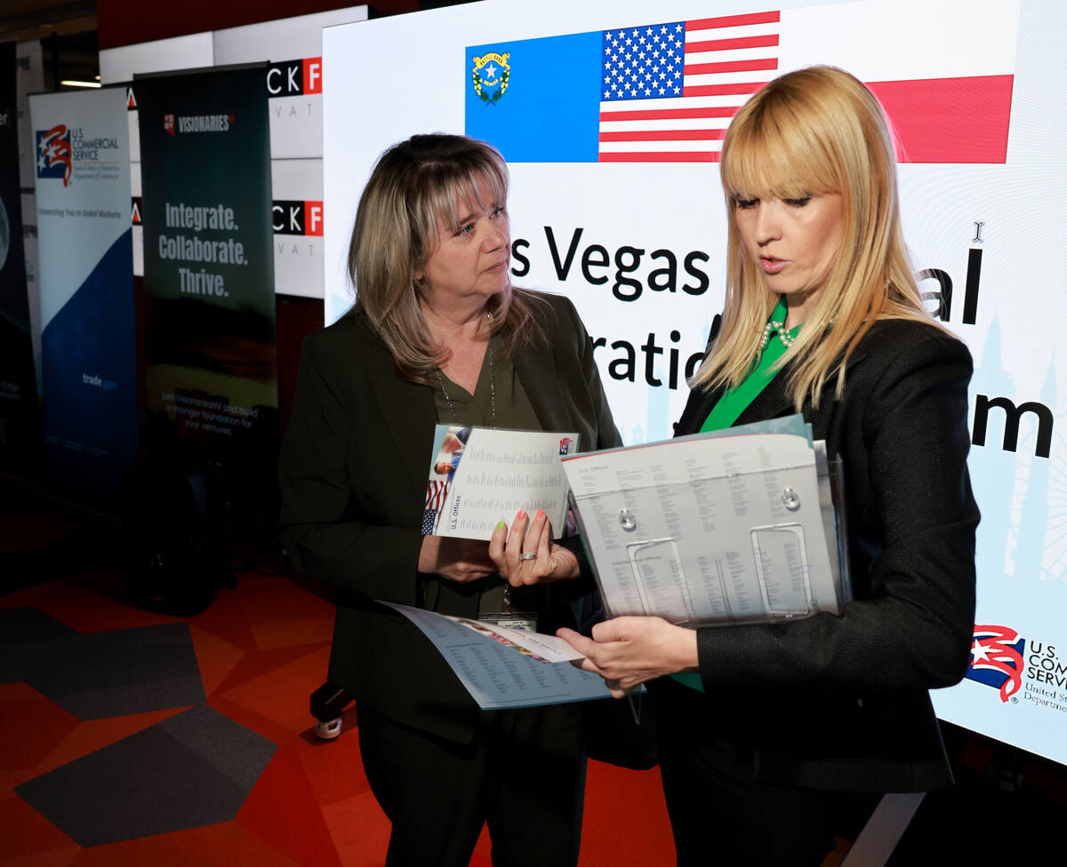 Dijana Mitrovic, with the U.S. Department of Commerce, right, and Terri Sheridan, economic deve ...