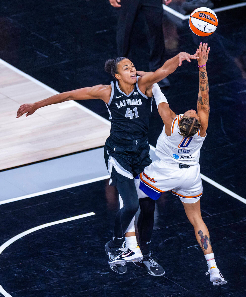 Aces center Kiah Stokes (41) rejects a shot attempt by Phoenix Mercury guard Natasha Cloud (0) ...