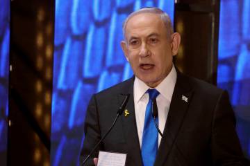Israeli Prime Minister Benjamin Netanyahu addresses a ceremony marking Memorial Day for fallen ...