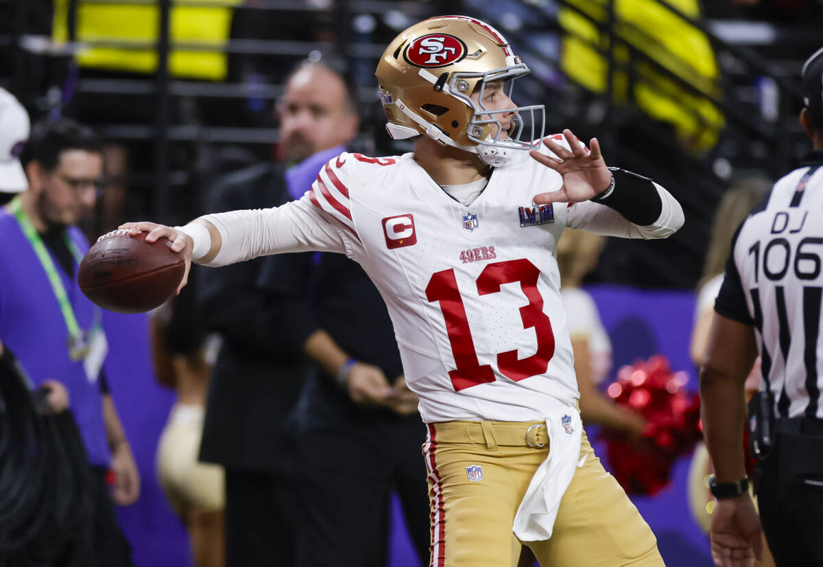 San Francisco 49ers quarterback Brock Purdy (13) looks to pass the ball during the first half o ...