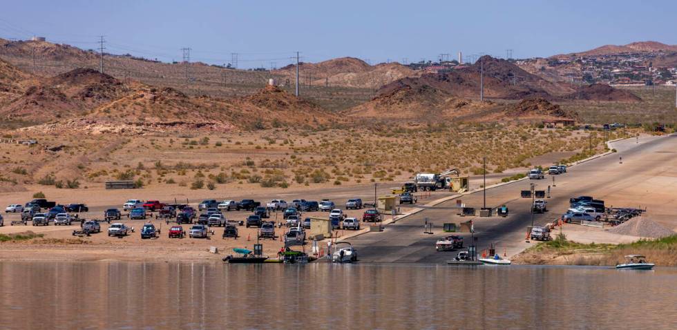 Boaters move about the Hemenway boat launch during a safe boating media event at the Lake Mead ...