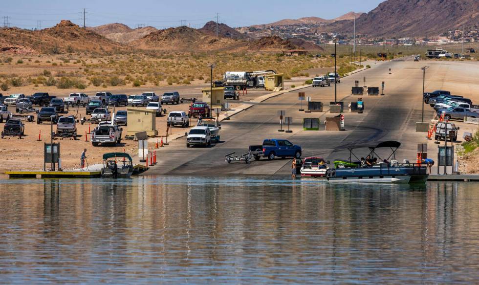 Boaters move about the Hemenway boat launch during a safe boating media event at the Lake Mead ...