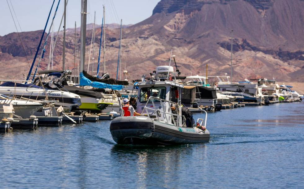 A law enforcement patrol boat makes its way back into the Lake Mead Marina during a safe boatin ...