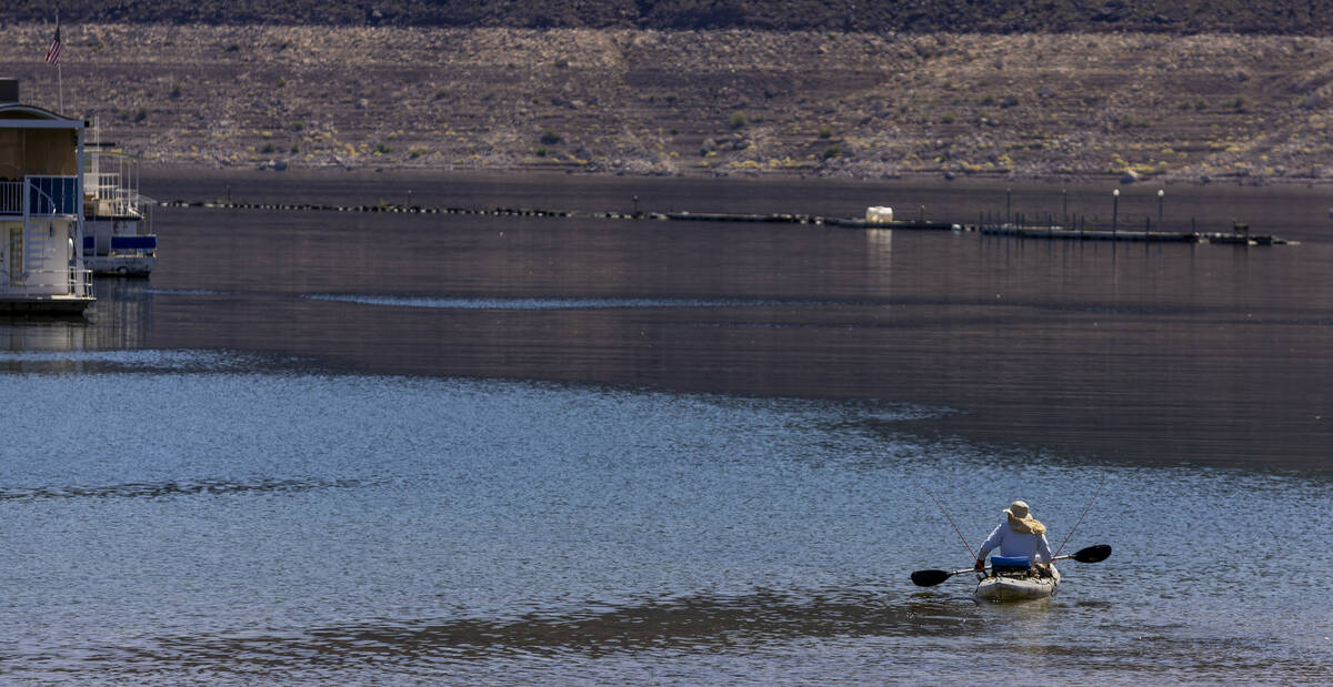 A fisherman heads out from the Lake Mead Marina during a safe boating media event at the Lake M ...