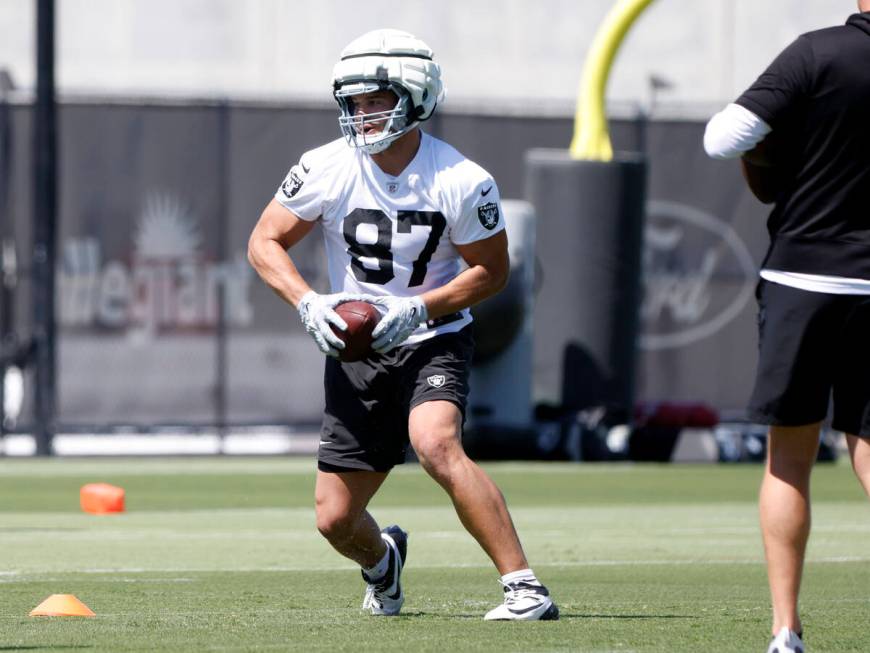 Raiders tight end Michael Mayer runs through drills during organized team activities at the Int ...